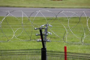 How Electric Perimeter Security Fences Protect Industrial Buildings
